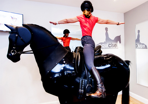 fitness classes on horse riding simulator,